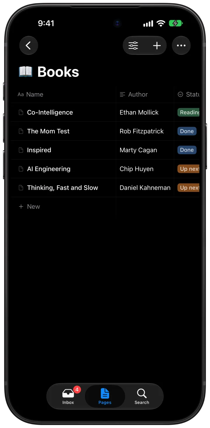 The table “Books” on iPhone in dark mode, with author and status